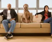 getty_rf_photo_of_dog_sitting_between_couple